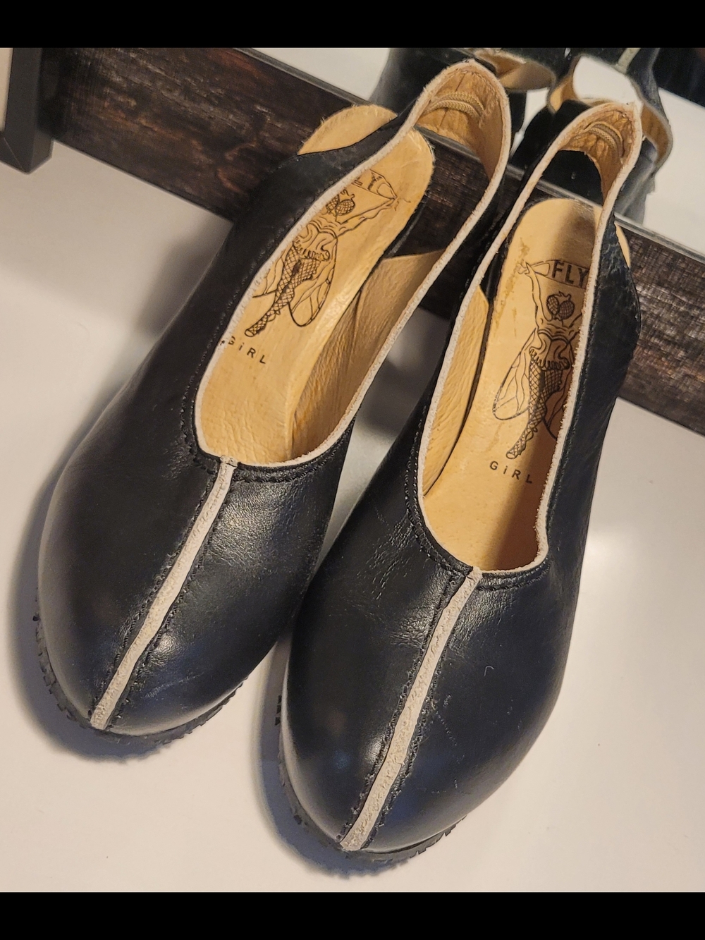 Fly London Black Leather Slip-On Heels with Contrast Trim